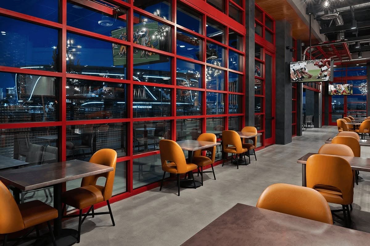 Commercial glass storefront with red framing in a Las Vegas sports bar
