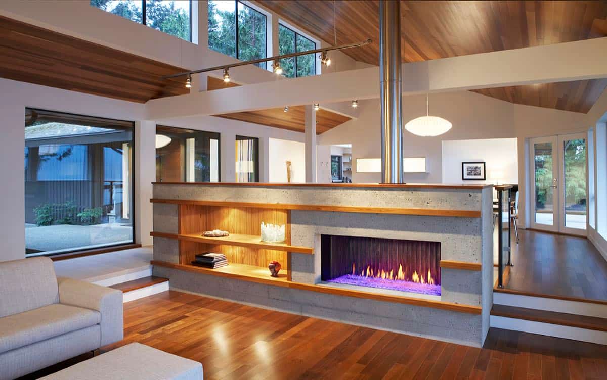Modern fireplace with custom glass and wood interior